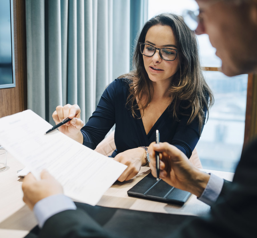 Coworkers reviewing a document